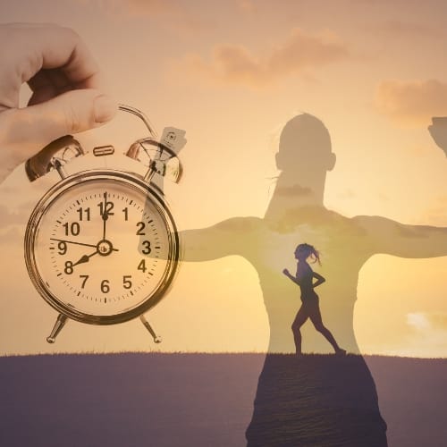 Motivational image showing a stopwatch and runner symbolizing time, discipline, and consistency